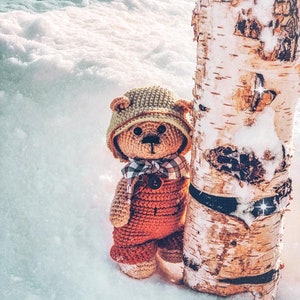 Crochet pattern Teddy bear in overalls and hat.