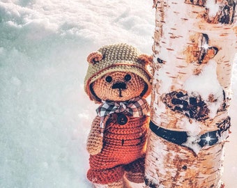 Crochet pattern Teddy bear in overalls and hat.