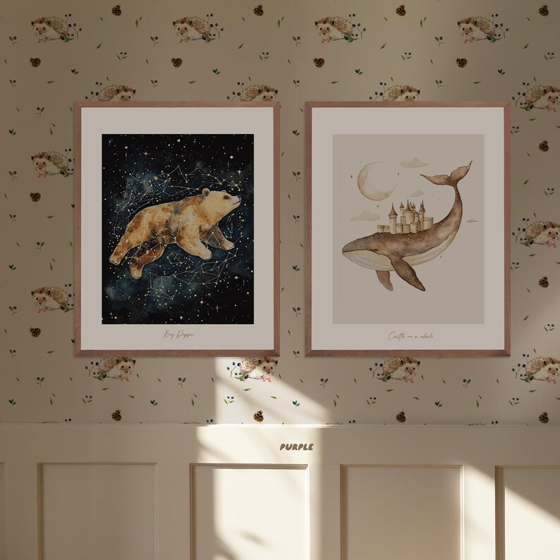 May include: Two framed watercolor illustrations. The first shows a brown bear walking on a starry sky with the text "Big Dipper". The second shows a whale with a castle on its back and the text "Castle in the clouds".