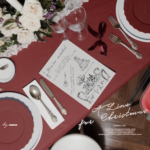 May include: A festive table setting with a burgundy tablecloth, white plates, and silverware. A card with the text "You're invited" and illustrations sits in the center. The words "A Line Christmas" are also visible.