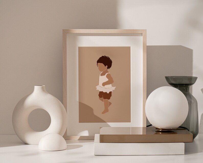 May include: A framed illustration of a young girl with brown hair wearing a white dress and brown shoes. The illustration is set against a light brown background.