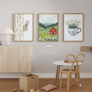 May include: Three framed illustrations for a nursery or child's room. The first shows a rabbit peeking out from behind a tree. The second shows a red house in a green field with white flowers. The third shows a white teacup with blue and green floral designs filled with white flowers.