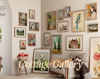 May include: A collection of framed artwork in a cottage style, featuring a variety of subjects including animals, landscapes, and still life. The artwork is displayed on a white wall with a brown armchair and a small table with a bowl of apples. The text "Cottage Gallery" is displayed below the artwork.