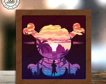 May include: A wooden shadow box with a cut-out design of a skull and crossbones. The background is a sunset scene with palm trees and a silhouette of a person standing on a beach.