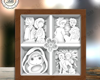 May include: A white papercraft shadow box with a wooden frame. The box is divided into four sections, each featuring a different character from the animated film Spirited Away. The characters are Chihiro, No Face, Haku, and the parents.