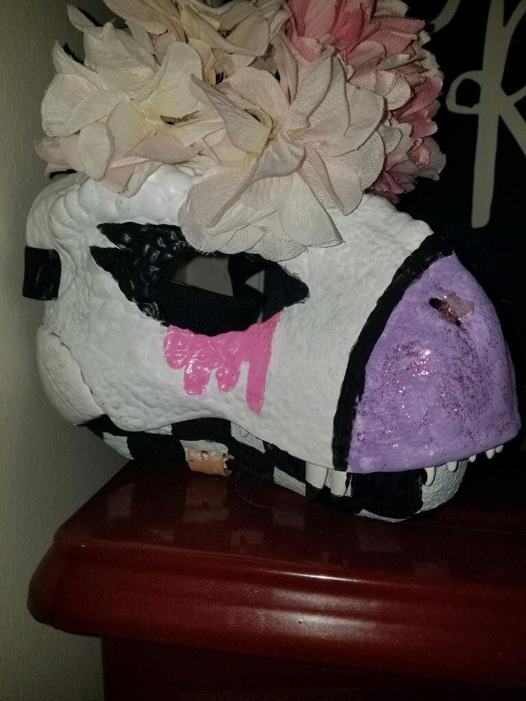 pink dinosaur helmet