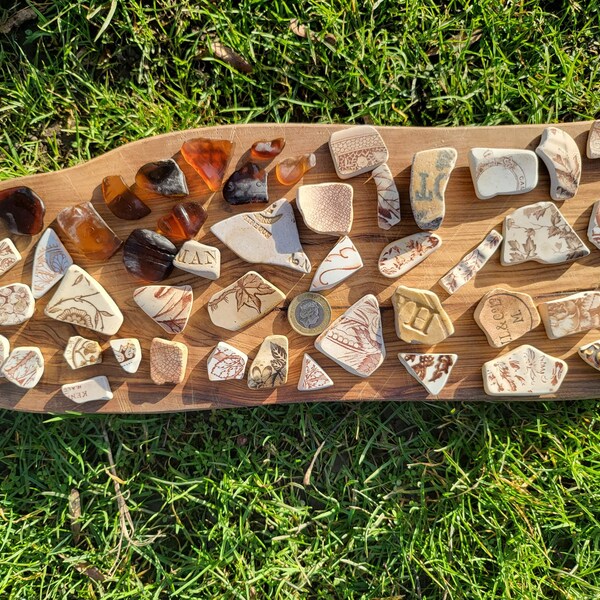 40 pieces of beachcombed brown sea pottery and 10 pieces brown sea glass