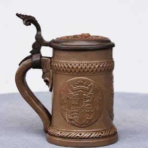 19th century Ironstone Beer Stein Germany  Villeroy And Boch Mettlach  With Green Man Head on lid