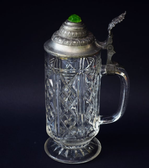 A Covered Green Glass A Covered Green Glass