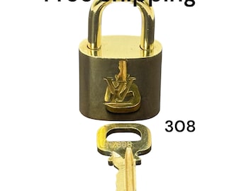 Lucchetto Louis Vuitton 308 autentico, usato ma in ottime condizioni, con chiave.