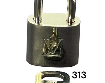 Preloved Authentic Louis Vuitton Padlock 313 with a key.