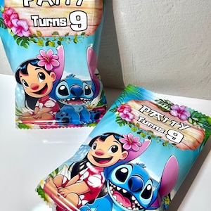 May include: Two blue and white treat bags with a cartoon image of Lilo and Stitch. The bags have a wooden sign with the text "Patty Turns 9" on them.