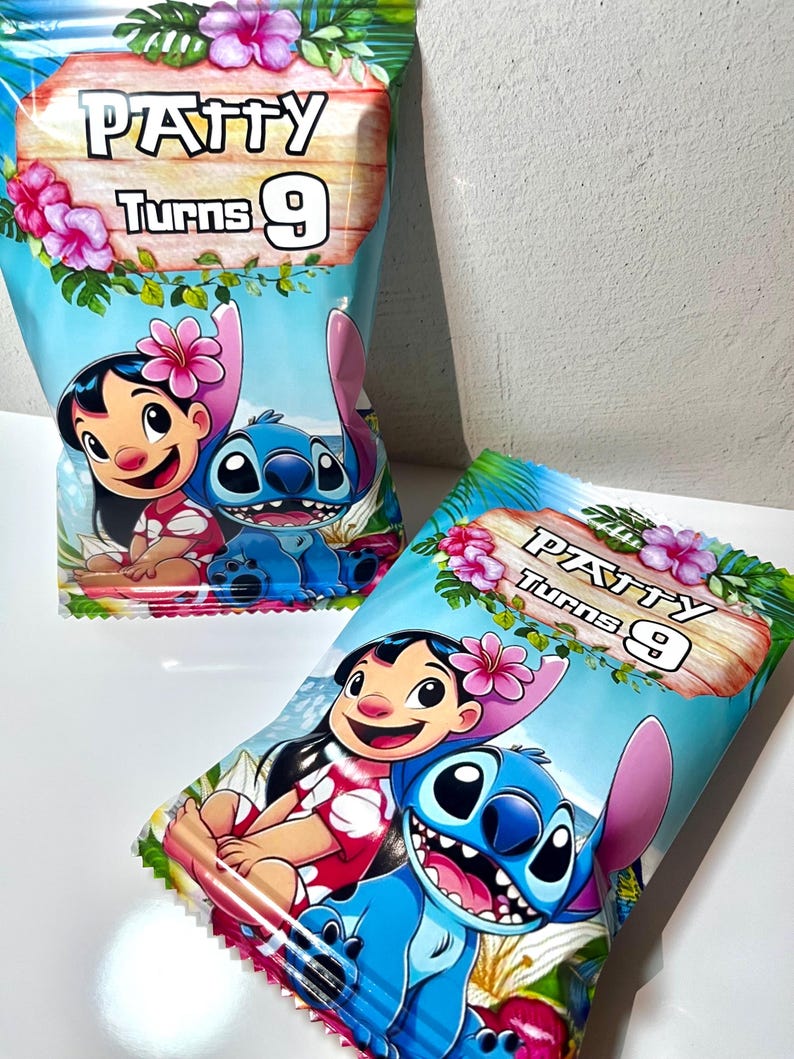 May include: Two blue and white treat bags with a cartoon image of Lilo and Stitch. The bags have a wooden sign with the text "Patty Turns 9" on them.