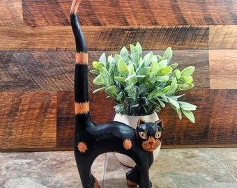 Vintage Handcarved Wooden Cat Figurine: Rustic Black and Beige
