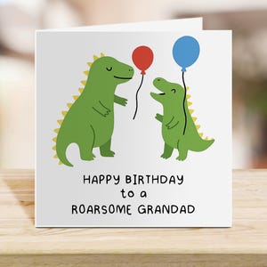 Biglietto di auguri di buon compleanno per il nonno - Biglietto con dinosauro ruggente dai nipoti - Biglietto di auguri di compleanno carino e divertente per il nonno - Design con palloncino a forma di dinosauro