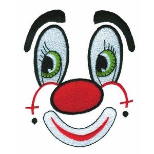 May include: A cartoon clown face with a big red nose, green eyes, and a white smile with a red outline.