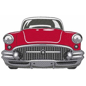 May include: A red vintage car with a chrome grille and headlights. The car is facing forward and the front bumper is visible.