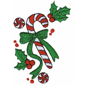 May include: A red and white candy cane with a green bow and holly leaves. There are also red and white peppermint candies.