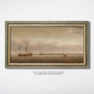 May include: A framed painting depicting a seascape with a large sailing ship in the foreground and a smaller sailboat in the distance. The sky is a soft, pale blue with wispy clouds. The water is a calm, light blue.