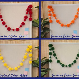 May include: Four images of pom-pom garlands in different colors. The garlands are hanging on a white board. The colors are red, orange, yellow, and green. The text below each image reads "Garland Color: [color]"