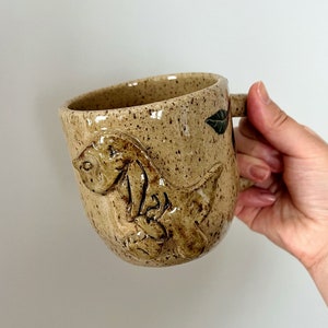 Little T-Rex in the Forest Mug - dinosaurs, coffee, tea, drinkware, cup, tumbler, handmade, gift, jurassic, plants, leaves, tyrannosaurus