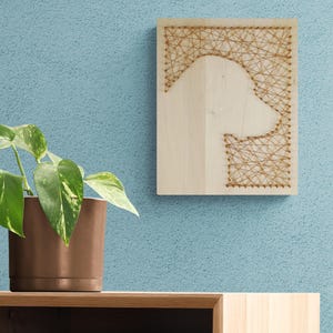 Copper Wire Dog Silhouette on Wood