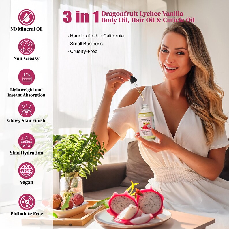 May include: A woman holds a bottle of 3-in-1 Dragonfruit Lychee Vanilla Body Oil, Hair Oil & Cuticle Oil. The bottle is clear with a white label and a dragonfruit illustration. The image also shows dragonfruit slices and lychees.
