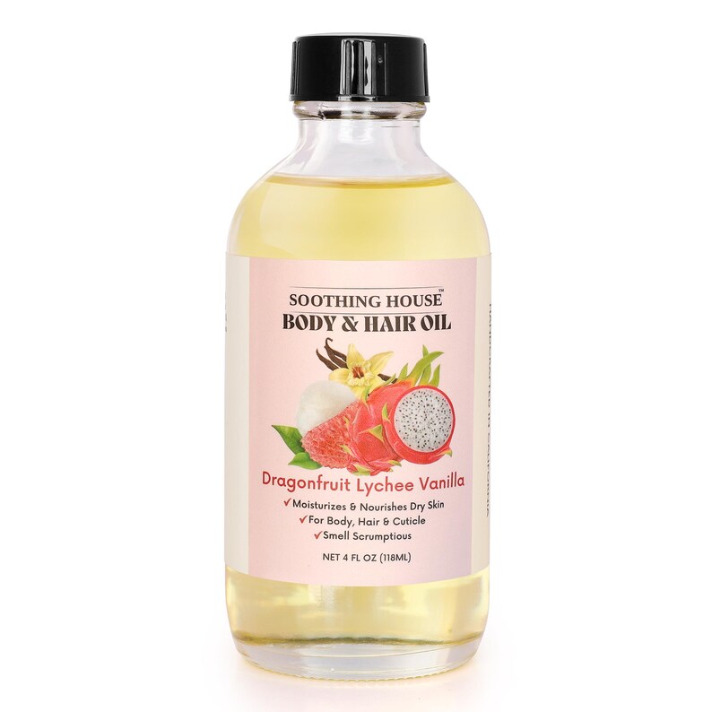 May include: A clear glass bottle of body and hair oil with a black cap. The label features the text "SOOTHING HOUSE BODY & HAIR OIL" and "Dragonfruit Lychee Vanilla." The label also includes a graphic of a dragon fruit and vanilla bean. The bottle contains 4 fl oz (118ml) of oil.