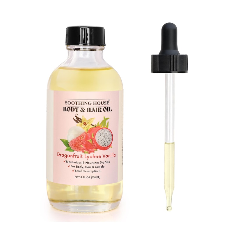 May include: A clear glass bottle of Soothing House Body & Hair Oil with a black cap and a dropper. The label features the text "Dragonfruit Lychee Vanilla" and illustrations of dragonfruit and vanilla. The bottle contains 4 fl oz (116ml) of oil.