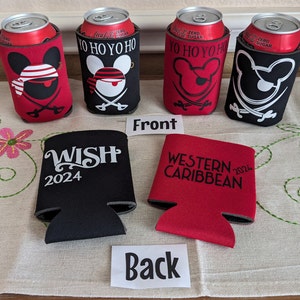May include: Four red and black can coolers with a Mickey Mouse pirate design on the front. The text "YO HO YO HO" is printed on the front of the coolers. Two black and white can coolers with the text "WISH 2024" and "WESTERN CARIBBEAN 2024" printed on the back.