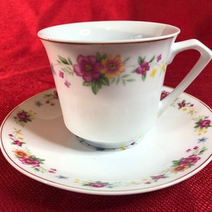 Floral teacup with gilt accents