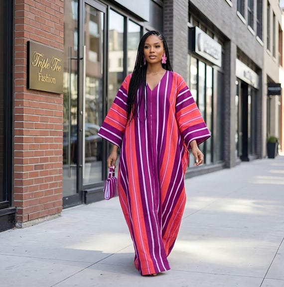 boubou dresses Freda - Elegant Purple African Print Loose fitting Dress | Traditional Ankara Kaftan for Women DPPAPMD25 | African Fashion it comes with a matching head wrap that is styled with grandeur in the shape of a fascinator African Boubou Dresses - Stylish