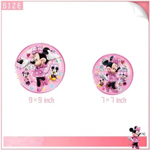 May include: Two pink Minnie Mouse themed plates. The larger plate is 22.86 x 22.86 cm and the smaller plate is 17.78 x 17.78 cm. Both plates feature Minnie Mouse in a pink dress with other characters and decorative elements.