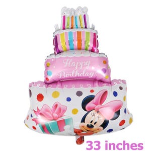 May include: Pink and white birthday cake balloon with a Minnie Mouse design. The balloon is 33 inches tall and features a pink bow, a gift box, and the words "Happy Birthday".