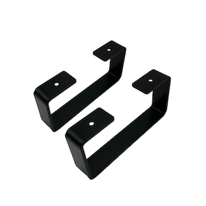 May include: Two black metal shelf brackets, each with a single hole in the top plate. The brackets are designed to be mounted to a wall or other surface and support a shelf.