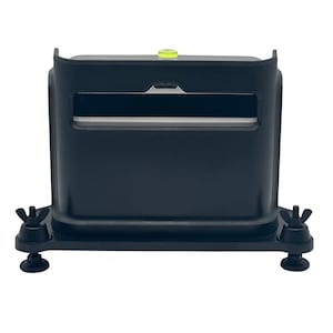 May include: Black plastic phone stand with a level bubble on top and adjustable feet. The stand has a slot for a phone to be placed in.