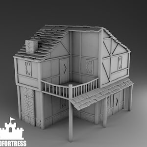 Casa medieval con balcón.