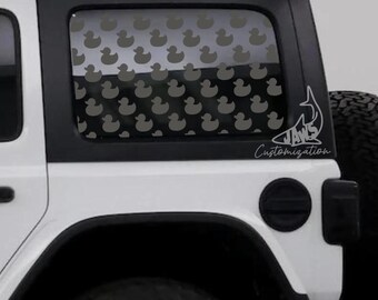 May include: A white Jeep with a black top and a window featuring a pattern of gray rubber duck silhouettes. The text "JAWS Customization" is displayed on the vehicle.