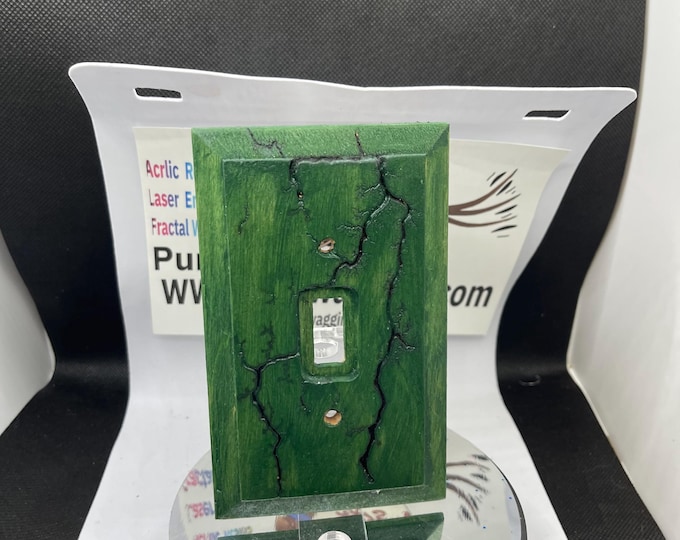 Fractal woodburning electric outlet covers