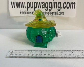 Pumpkin house green jar with a witches hat lid with LED lights