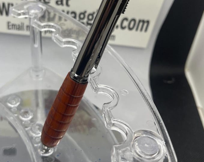 Four-way, pen, and pencil turn it to select to write in red and blue pen black pen  or pencil made from Red padauk gunmetal black metal
