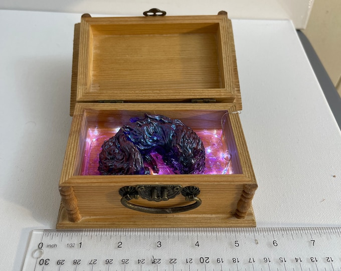 Blue metallic wolf spirit in a wooden box with fractal woodburning that lights up when you open the box all the way