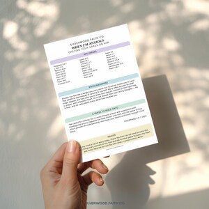 May include: A white informational card titled "When I'm Anxious: Casting Your Cares on Him" by Silverwood Faith Co. The card features sections for Key Verses, Encouragement, A Verse to Hold Onto, and Prayer, printed in black text with pastel coloured headers.