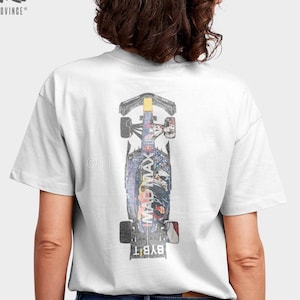 May include: White t-shirt with a graphic of a Formula 1 race car printed on the back. The car is upside down and the text "BYBIT" and "MAX VERSTAPPEN" are visible.