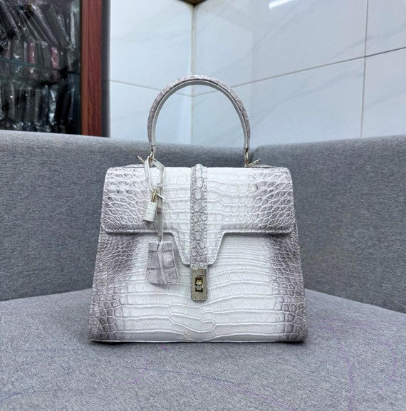 white crocodile handbag