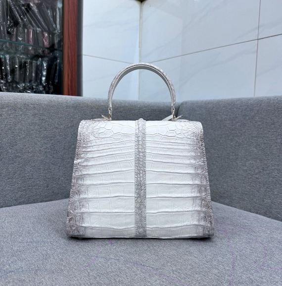 white crocodile handbag