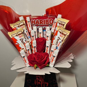 Bouquet of mix chocolate bars +medium bear + HB balloon.. …