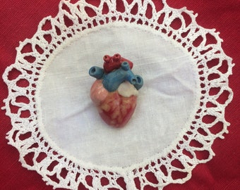 Enamelled earthenware anatomical heart brooch