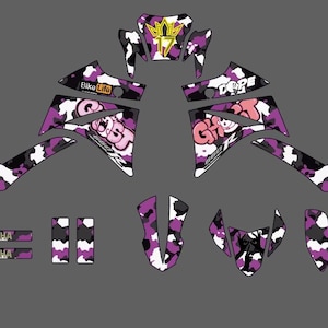 May include: A set of motorcycle decals in a purple, black, and white camouflage pattern. The decals feature the word "Ghost" in a graffiti style, along with the Yamaha logo and the words "Bike Life" and "Dope".