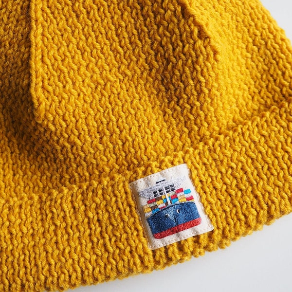 Hand knitted hand embroidered beanie cargo ship